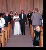 just married couple coming down isle at yosemite chapel